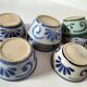 7 stoneware bowls with blue and green ocean-inspired decoration