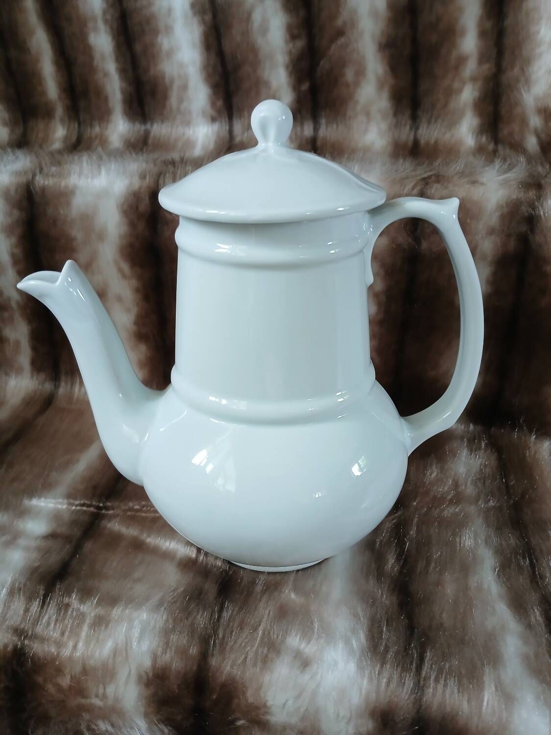 White ceramic coffee pot