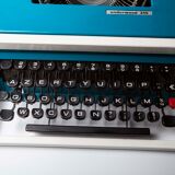 Underwood 315 blue typewriter with satchel