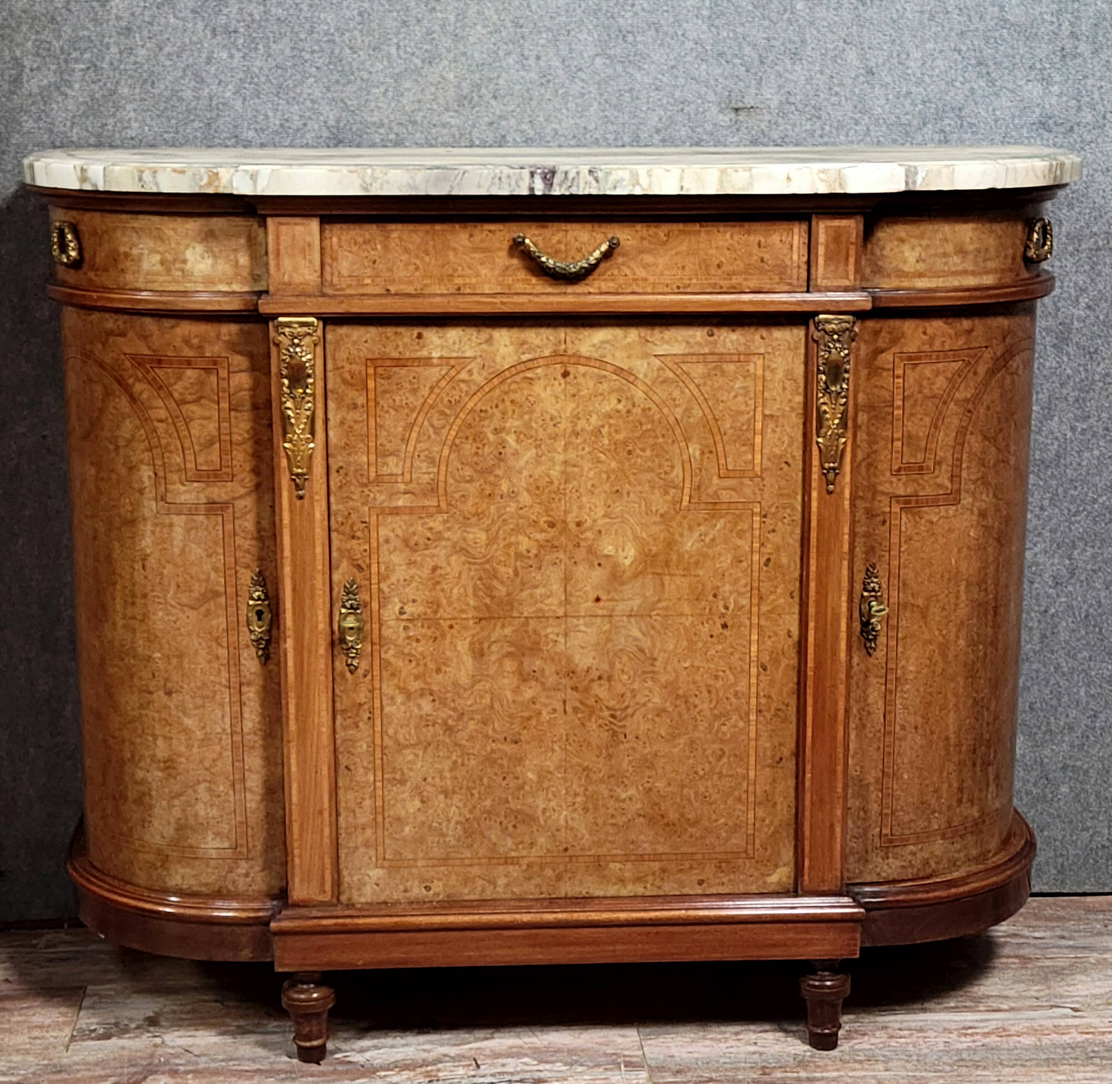 Half-moon buffet in Louis XVI style with burl and marquetry.