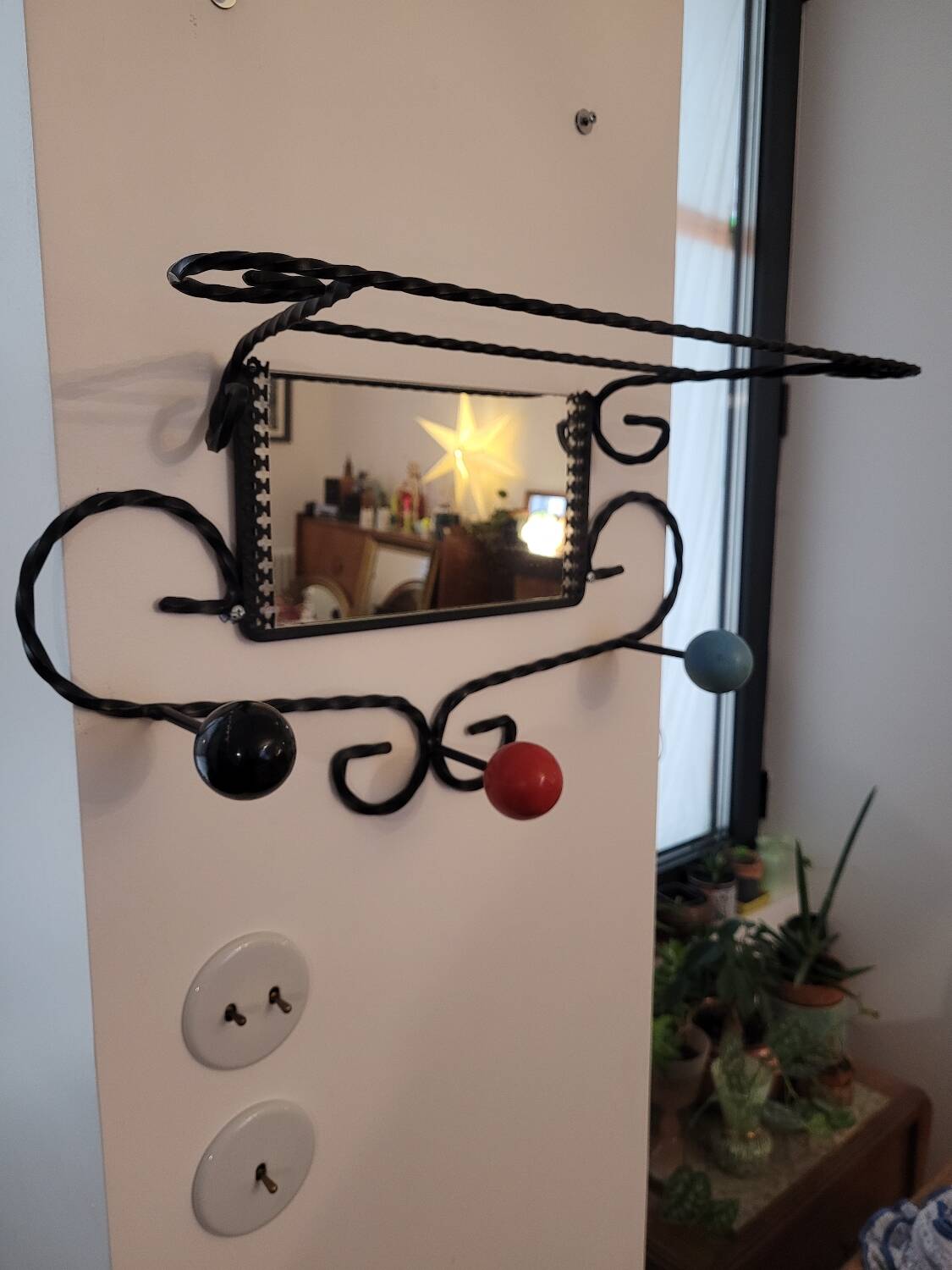 Wrought iron coat rack