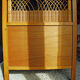 Wooden bed and vintage rattan