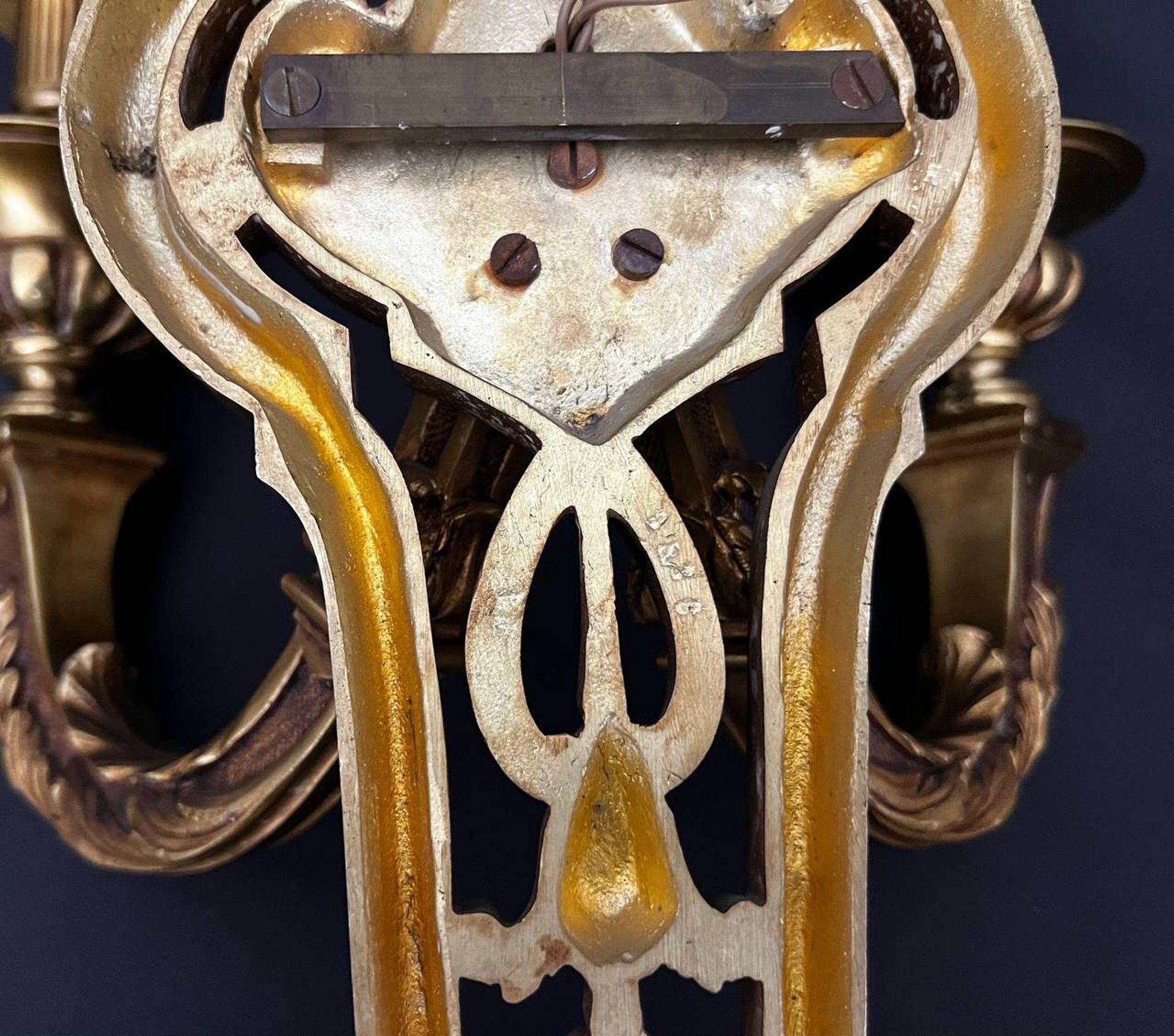 Large pair of gilt bronze wall sconces in the Louis XVI style.