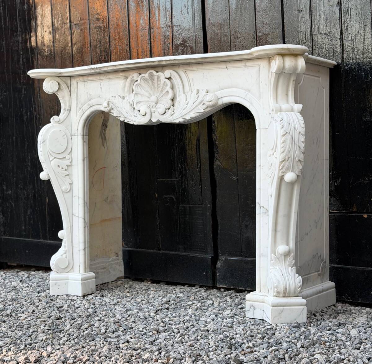 Louis XV style fireplace in Carrara marble, circa 1980.