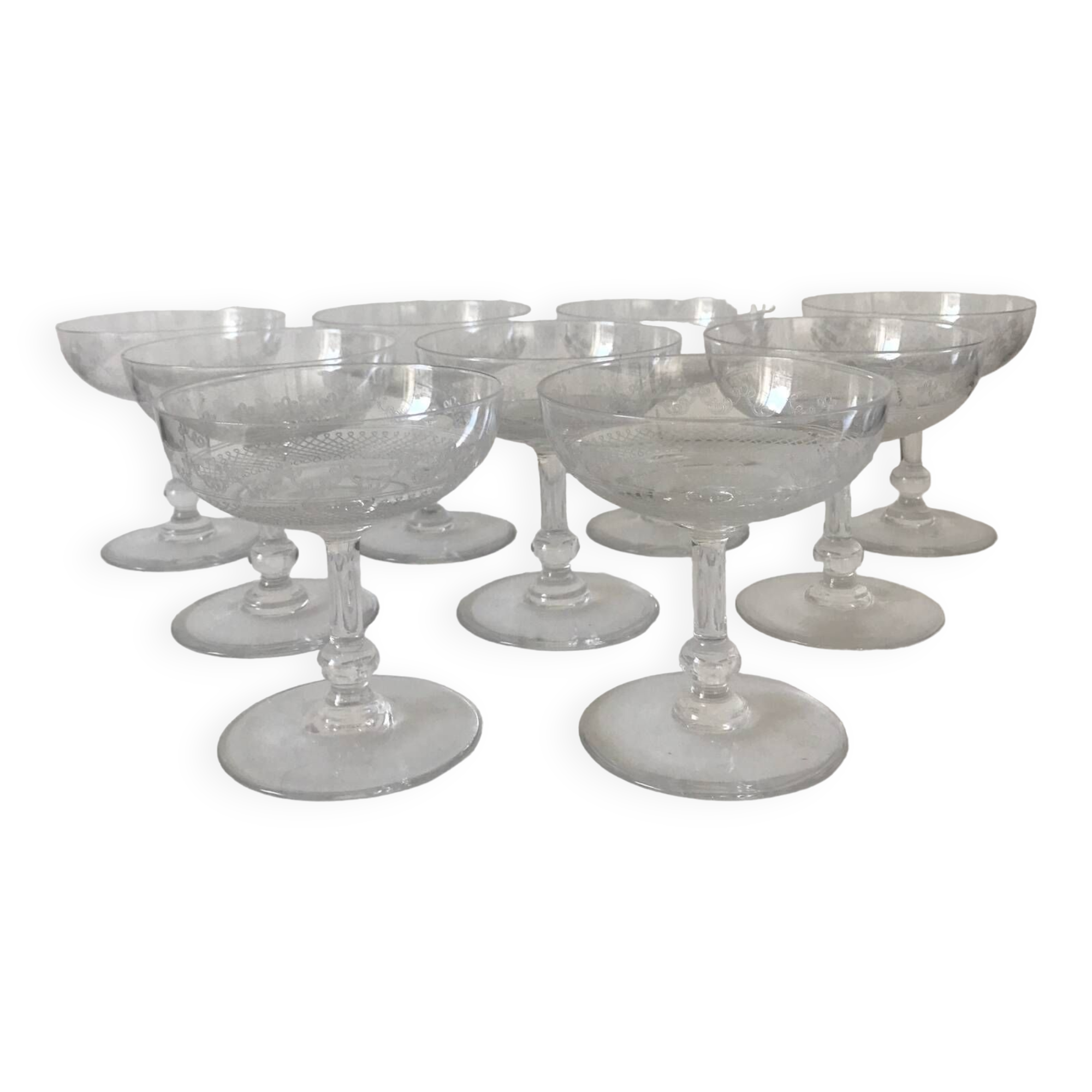 Set of 9 antique champagne glasses in engraved glass