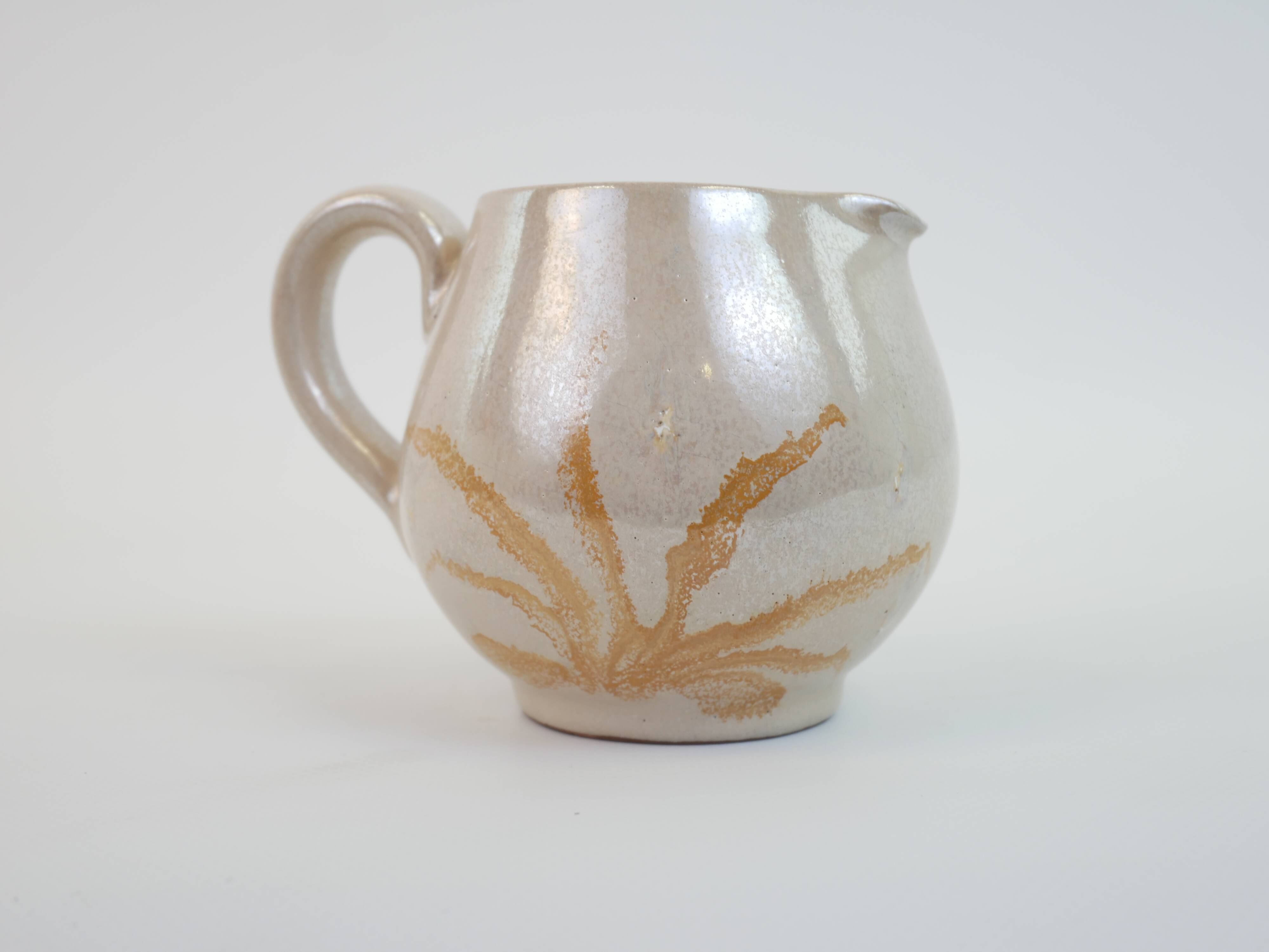 Pair of ceramic milk jugs signed La Roue Vallauris