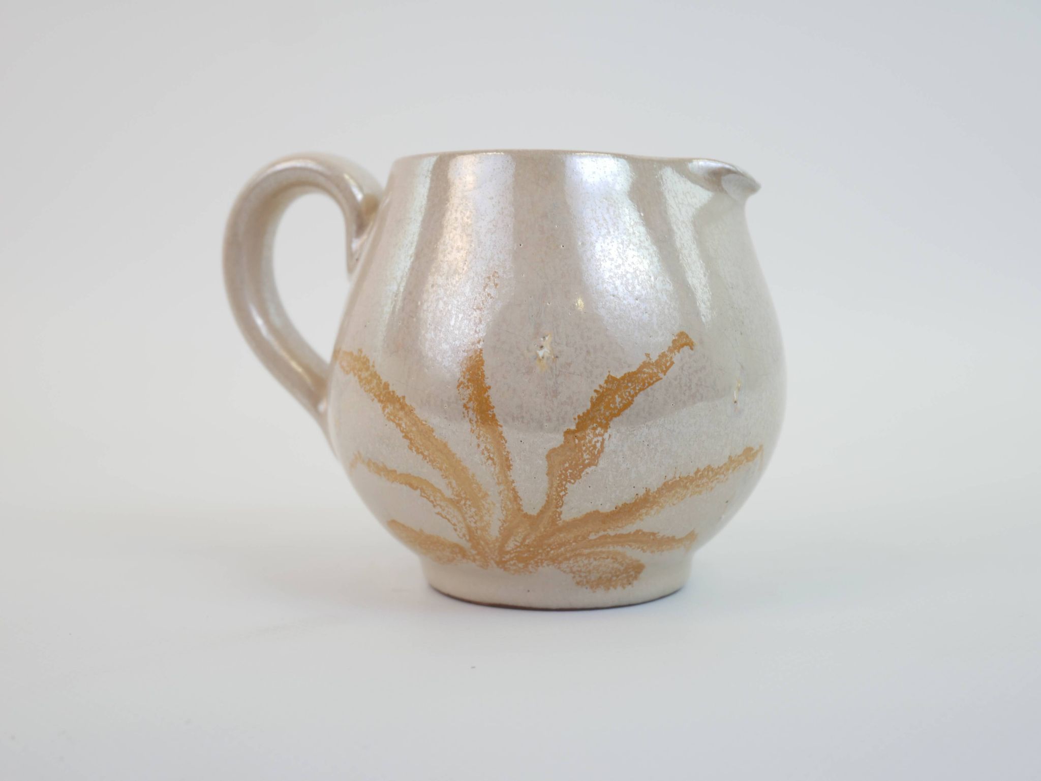 Pair of ceramic milk jugs signed La Roue Vallauris