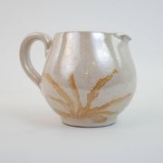 Pair of ceramic milk jugs signed La Roue Vallauris