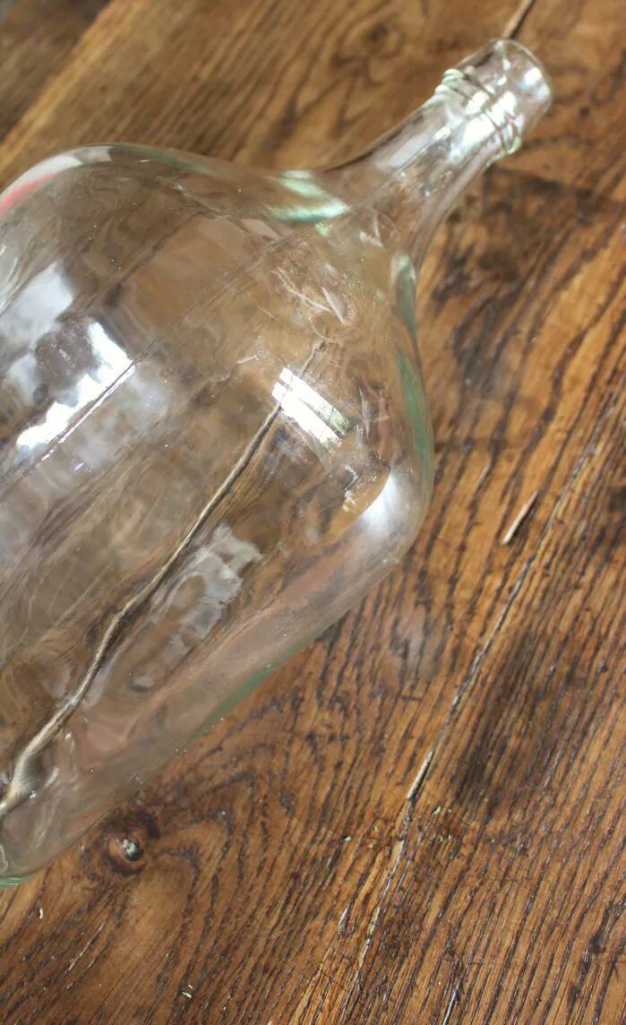 Clear glass demijohn carboy