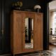 Art deco wardrobe in raw oak with bevelled mirror.