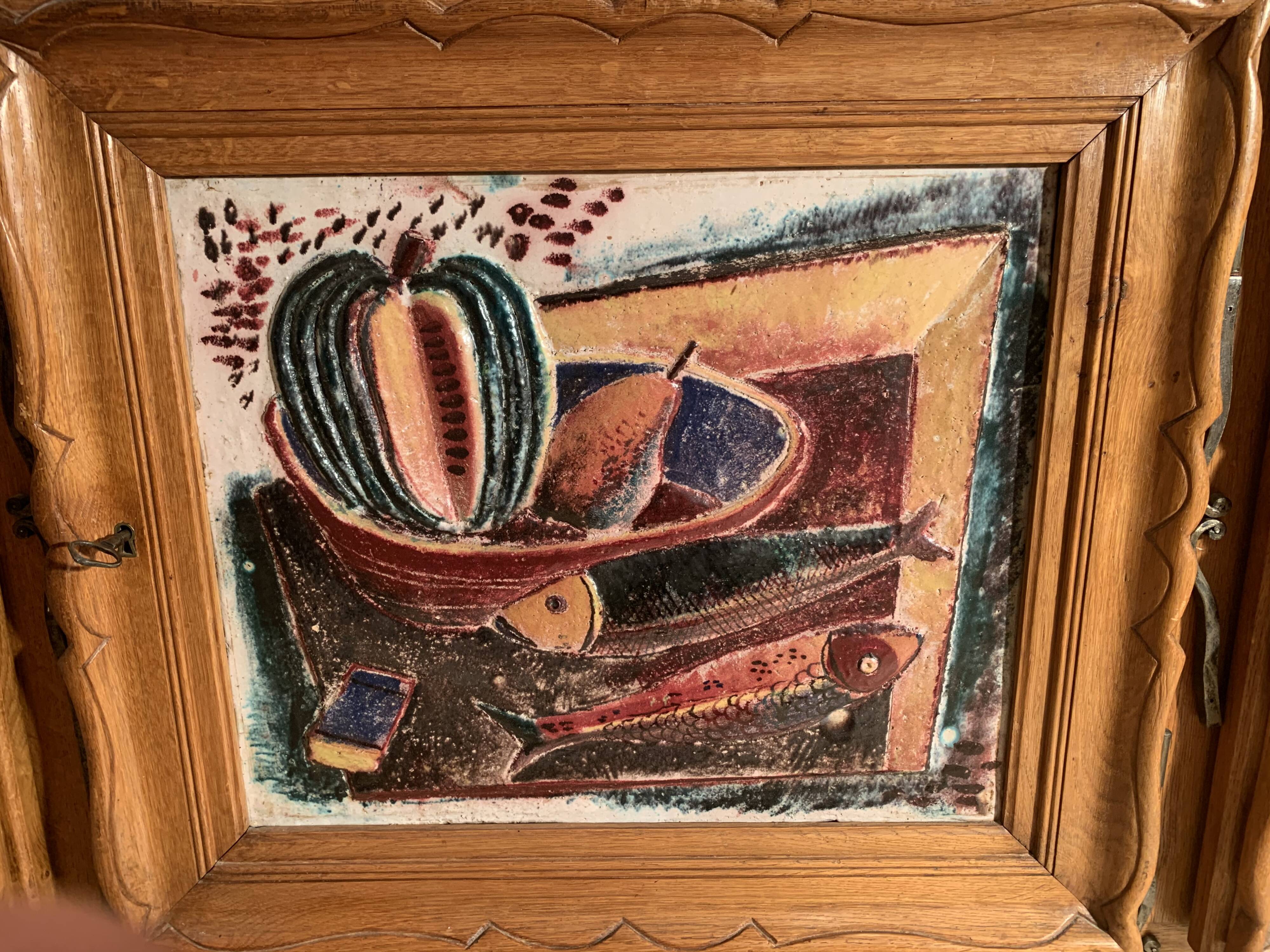 Modernist wood and ceramics sideboard of the 1950s