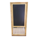 19th-century gilded trumeau mirror with restaurant slate.