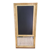 19th-century gilded trumeau mirror with restaurant slate.