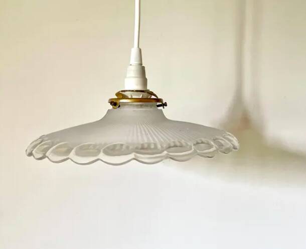 Pendant light with clear and frosted glass bowl