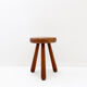 Brutalist tripod stool in solid wood, around 1960.
