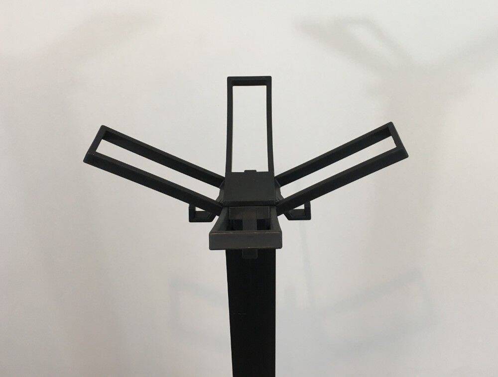 Michele De Lucchi & Tadao Takaichi for Kartell. Black plastic coat rack "Segmenti". Italy. 1989
