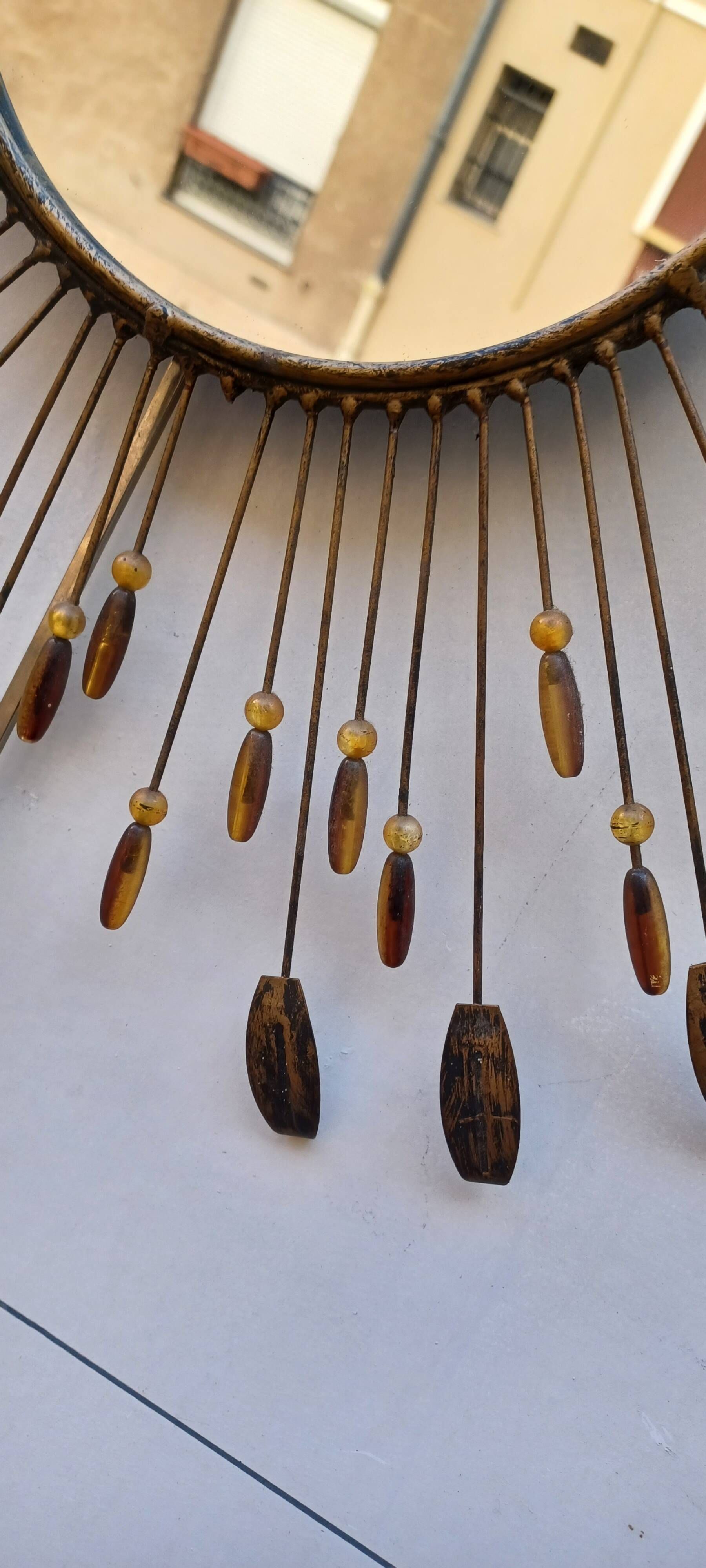 Sun mirror in line vautrin style with metal and coloured plastic beads