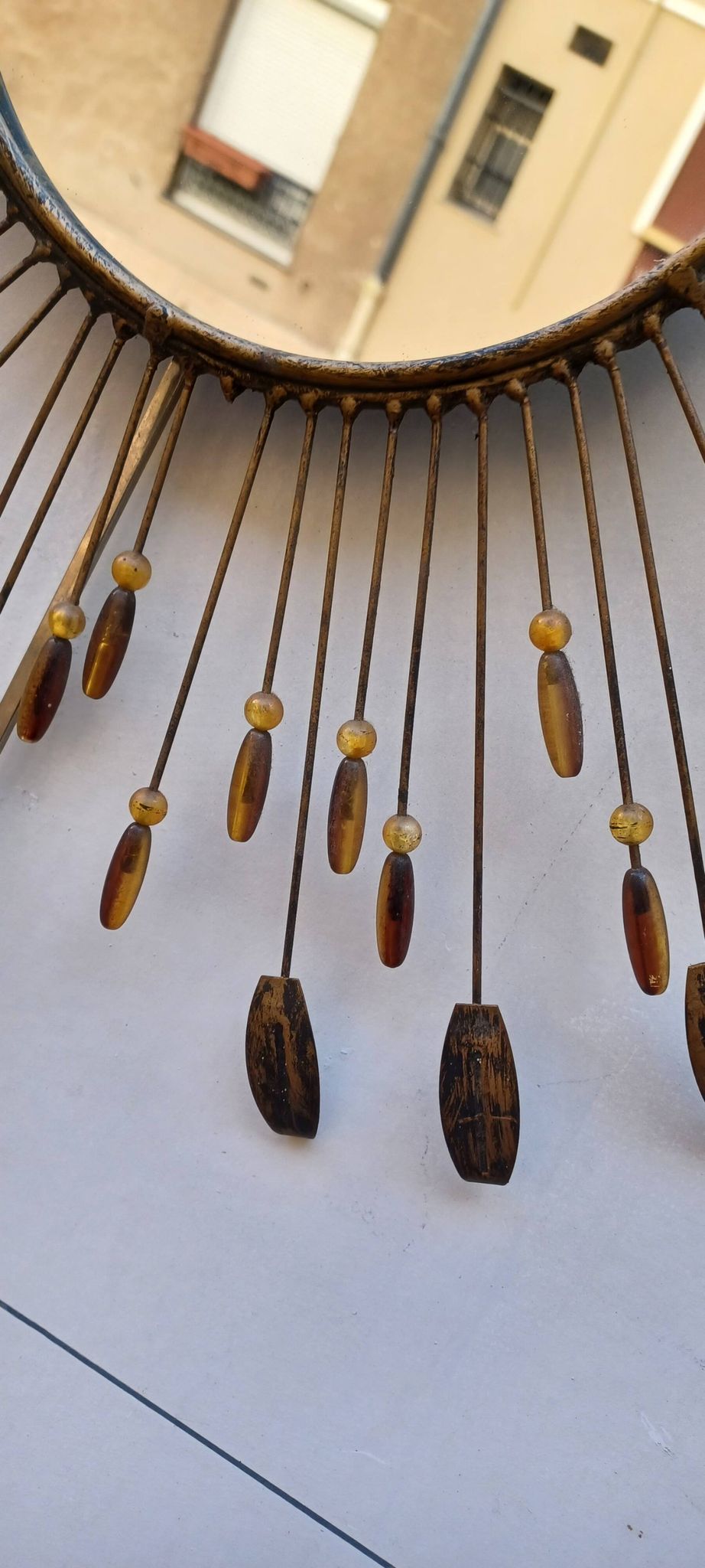 Sun mirror in line vautrin style with metal and coloured plastic beads