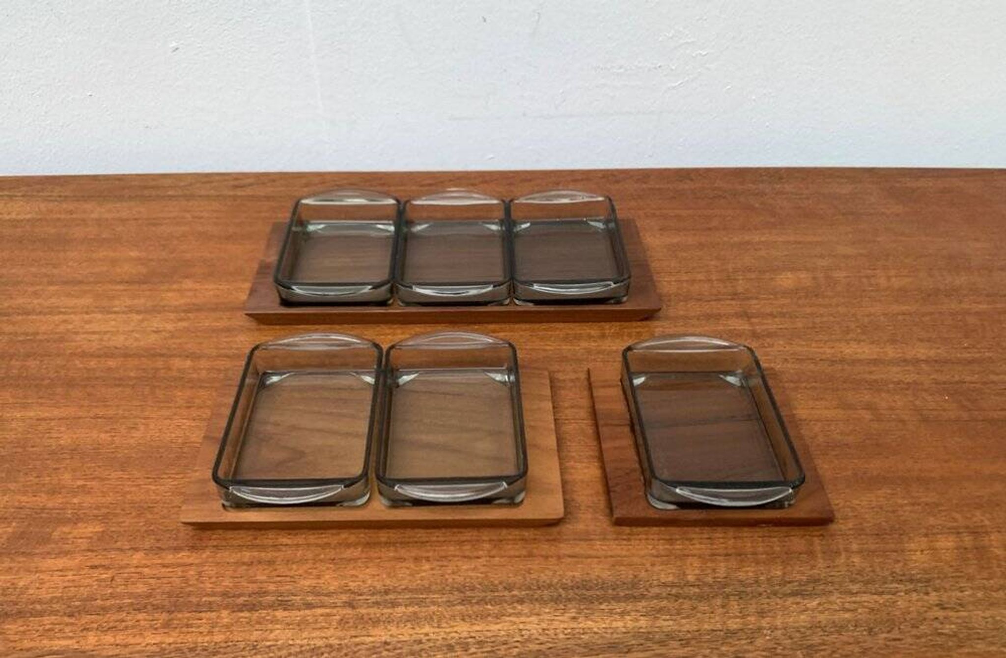 Danish mid-century teak plateau with Holmegaard glass serving trays, 1960s, set of 9.