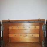 Old wooden key box cut out in the shape of a lock