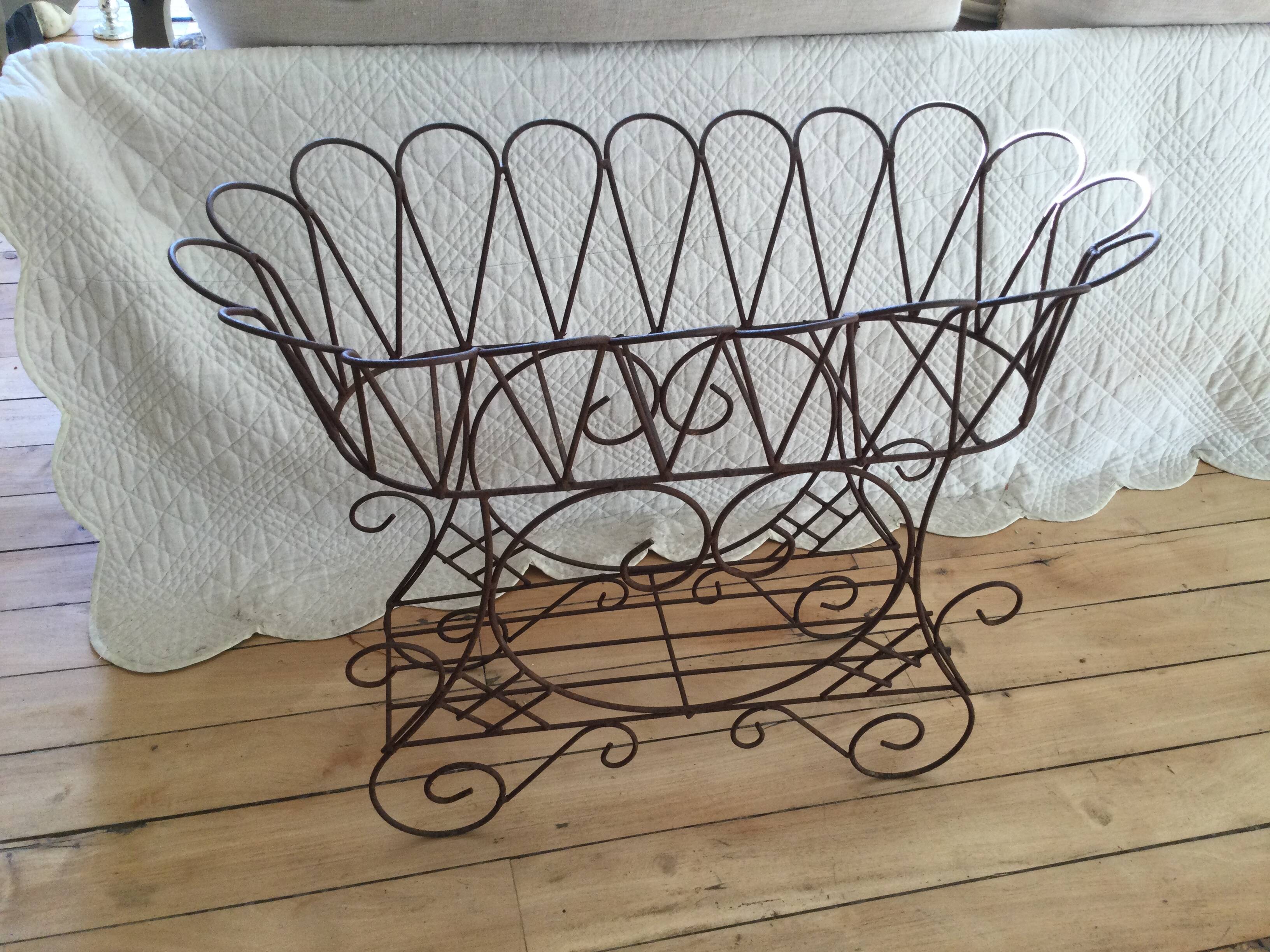 Antique iron plant stand