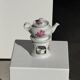Complete porcelain teapot and warmer with pink floral decoration H18