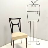 Ensemble de six chaises de salle à manger en hêtre noirci avec revêtement en skaï ivoire, Italie