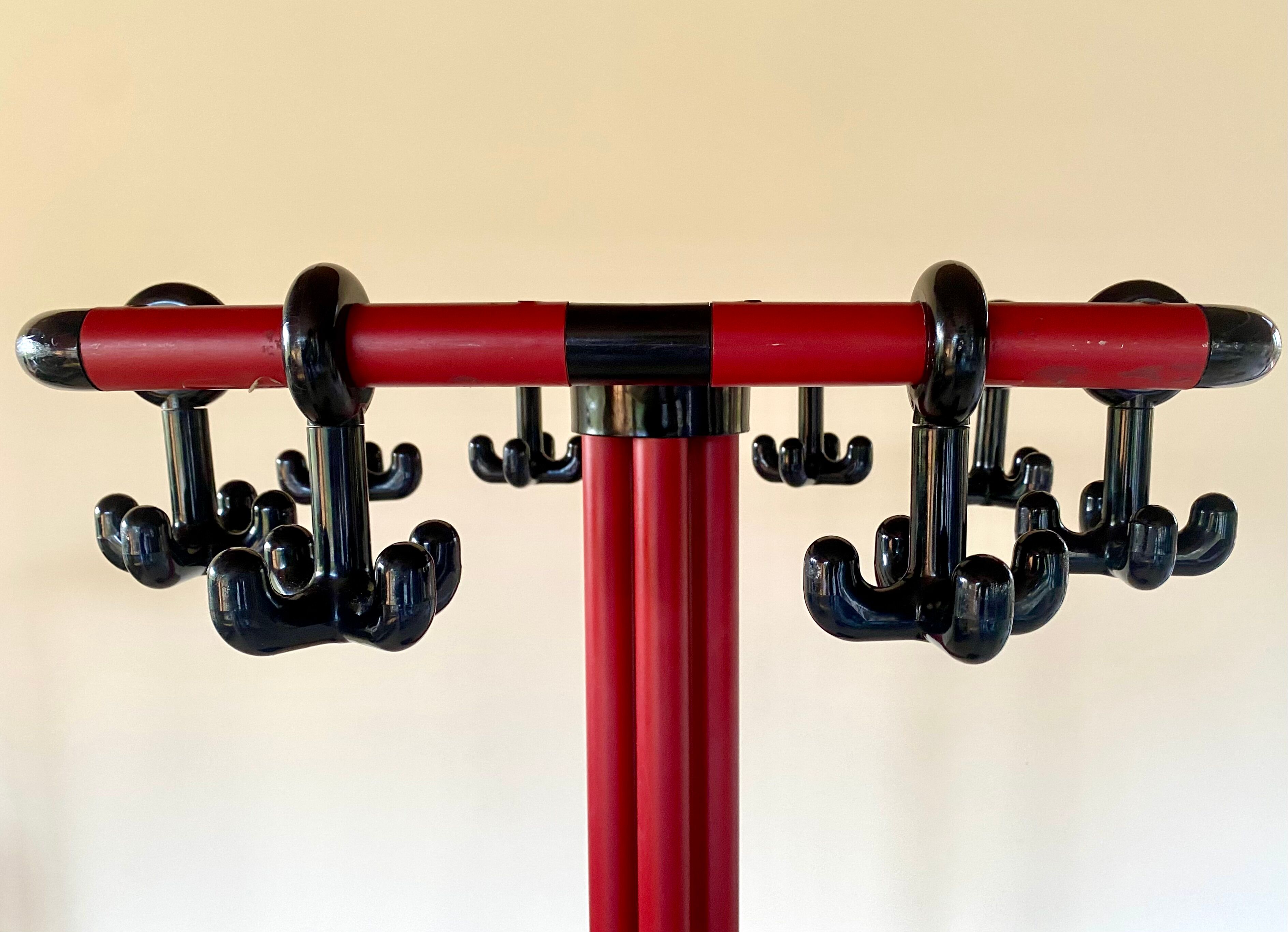 Red and black coat rack design 1980s