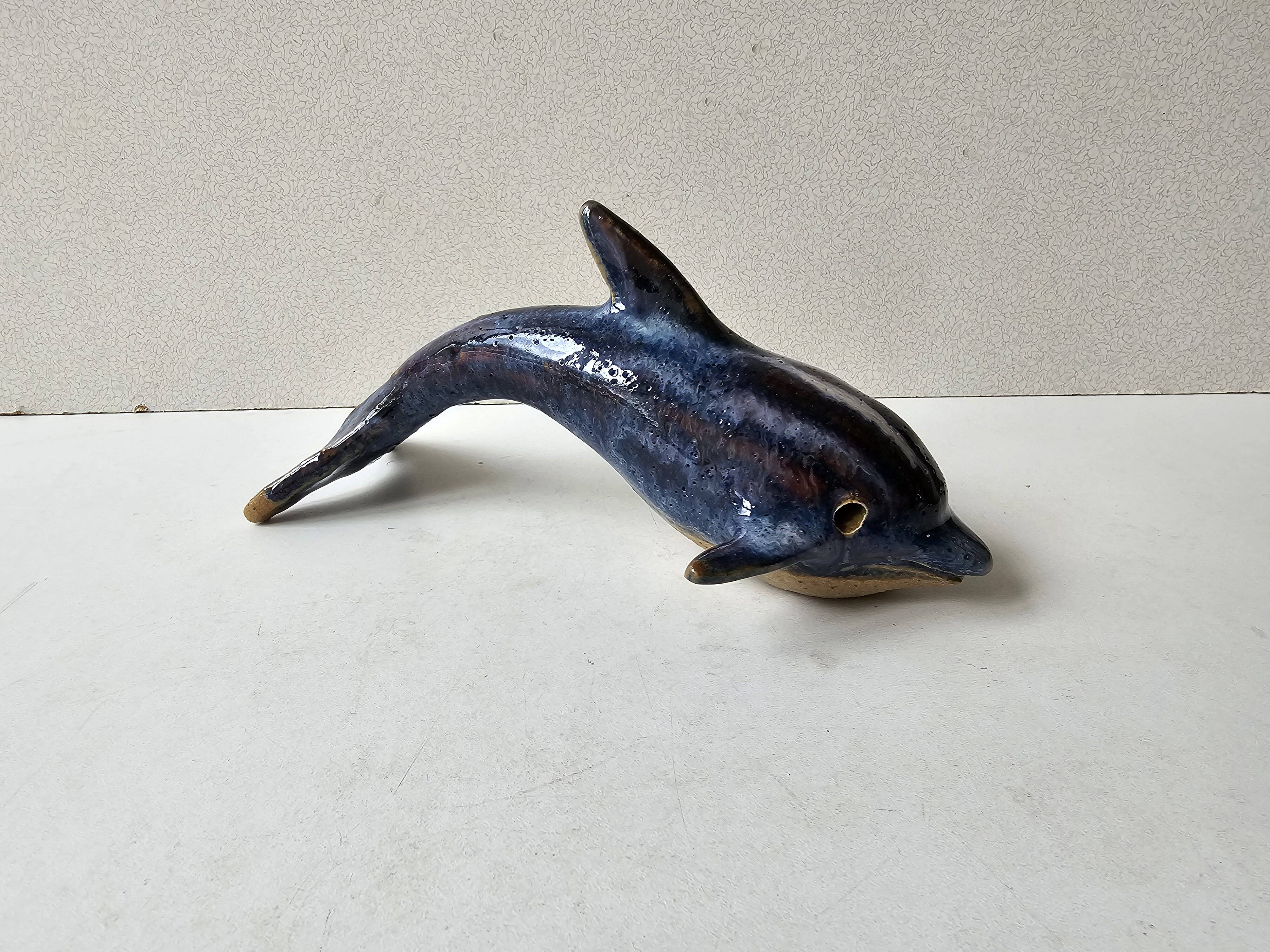 Signed blue ceramic dolphin sculpture (Signature to be identified)