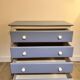 Wooden chest of drawers with tapered legs