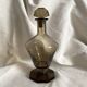 Art Deco smoked glass carafe with fan-shaped stopper.