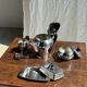 Tea set including teapot, milk jug, sugar bowl and butter dish