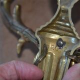 2 sculpted bronze wall lights