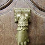 Solid bronze door knocker, hand shape, 19th century