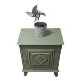 Bedside table with floral sculptures