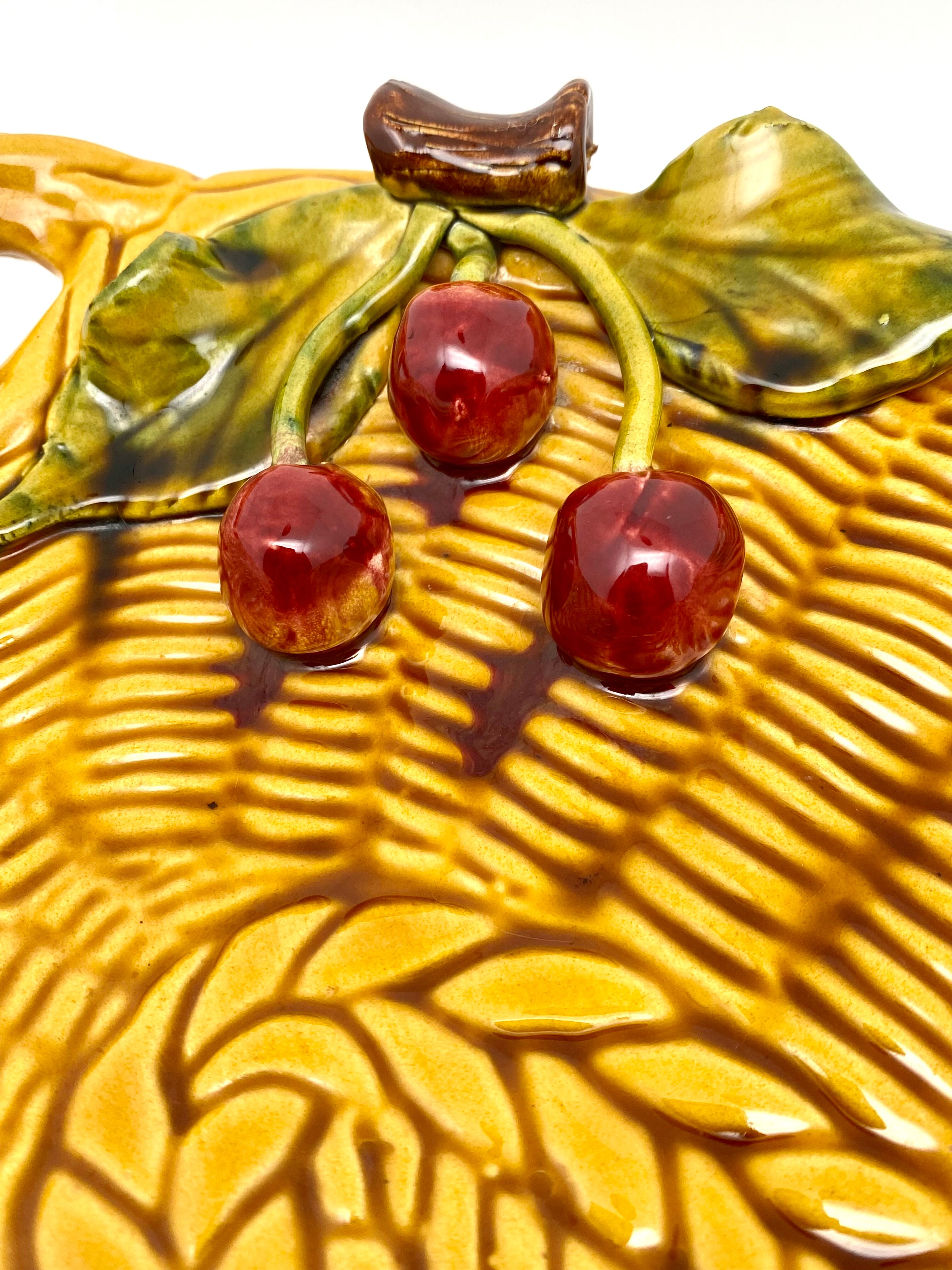 Decorative basket-shaped dish with Cherries
