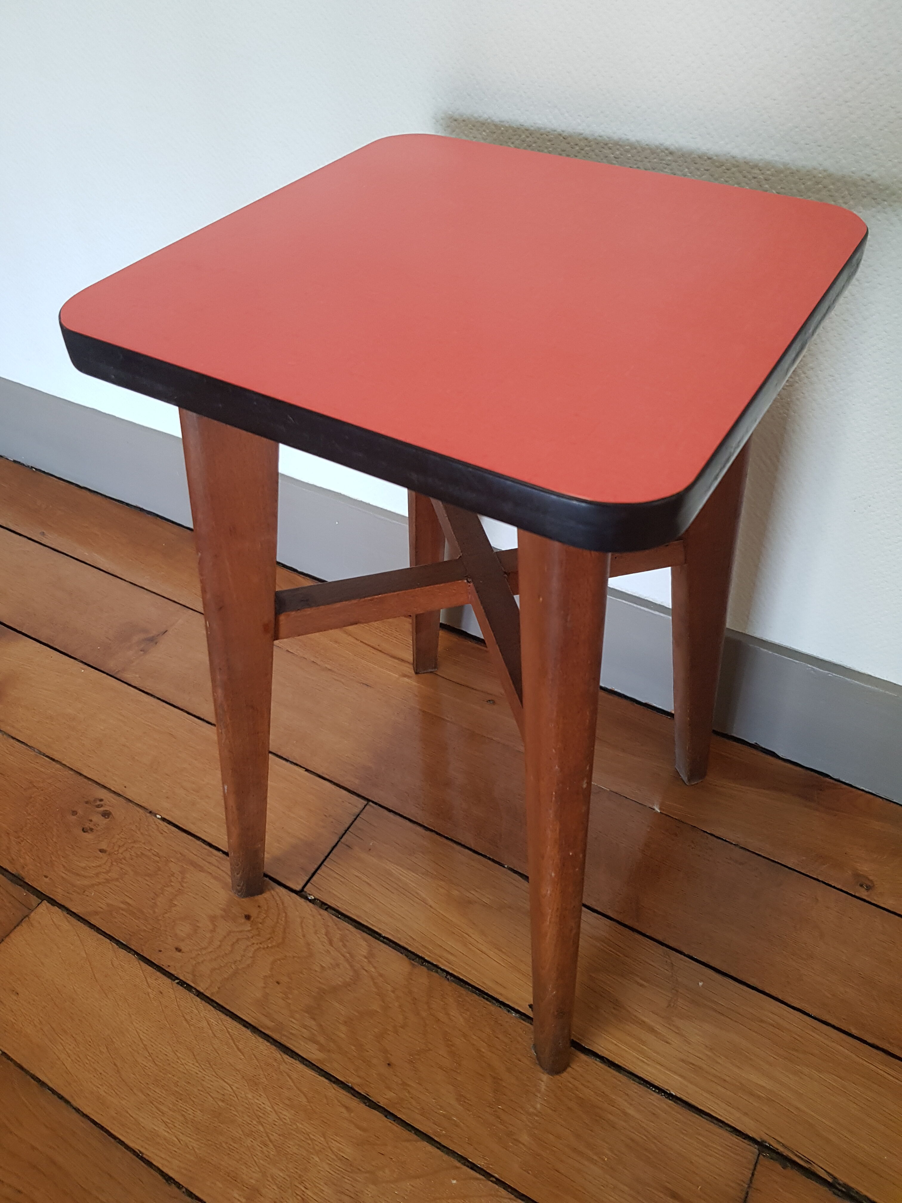 Wooden and red formica stool