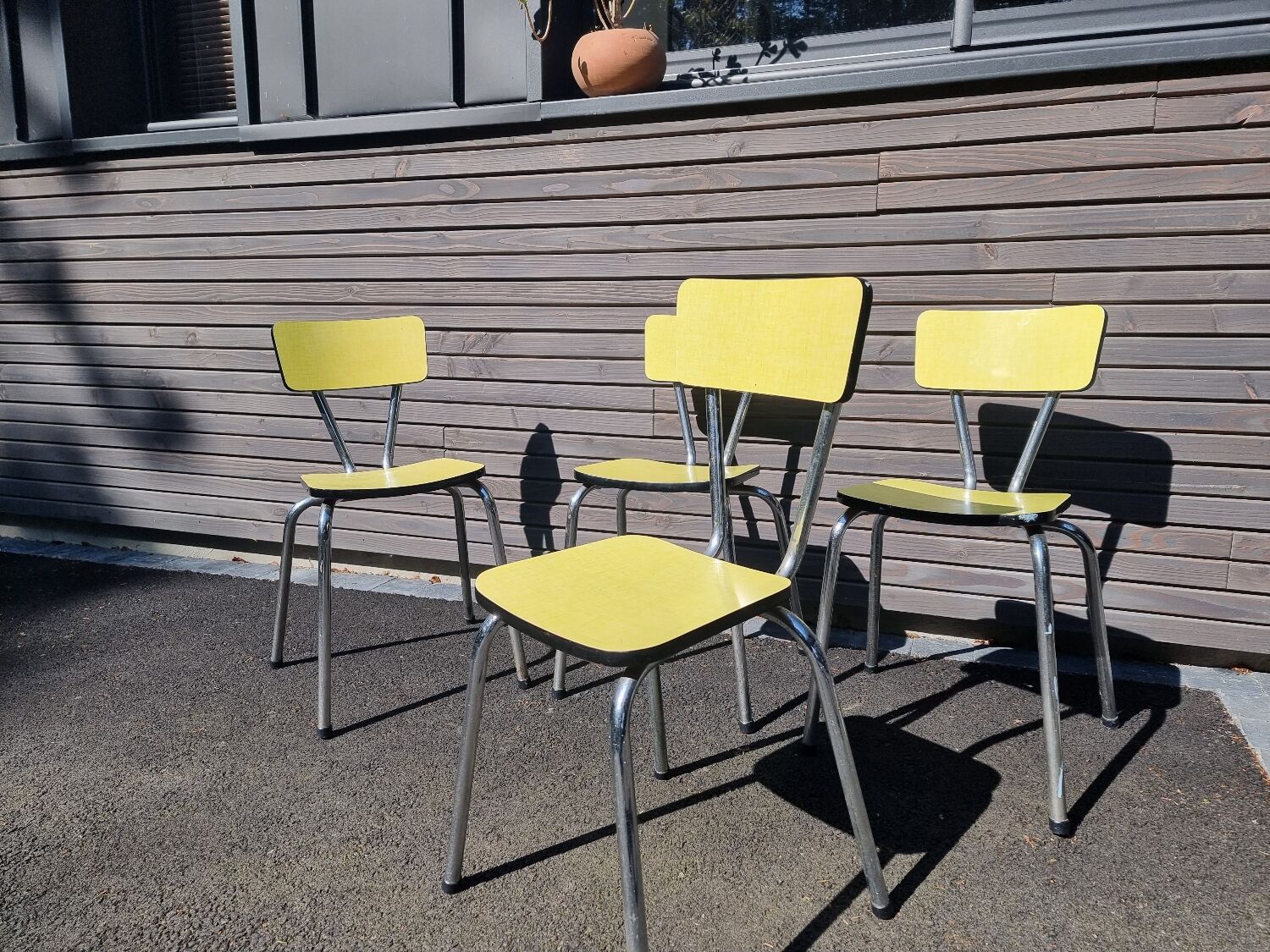 4 vintage Formica yellow chairs