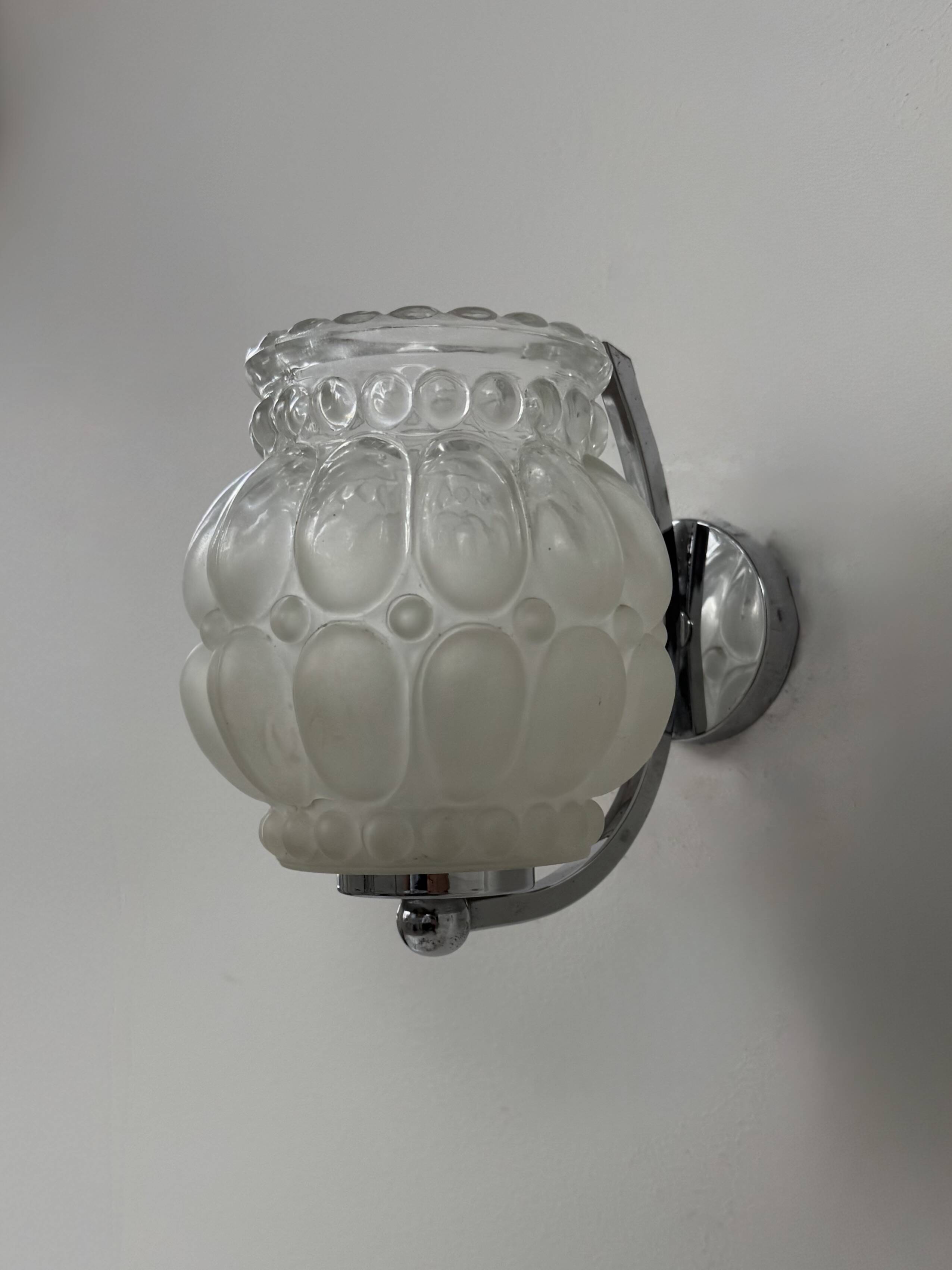 Pair of vintage chrome metal and bubble glass wall lights, France, 1950.