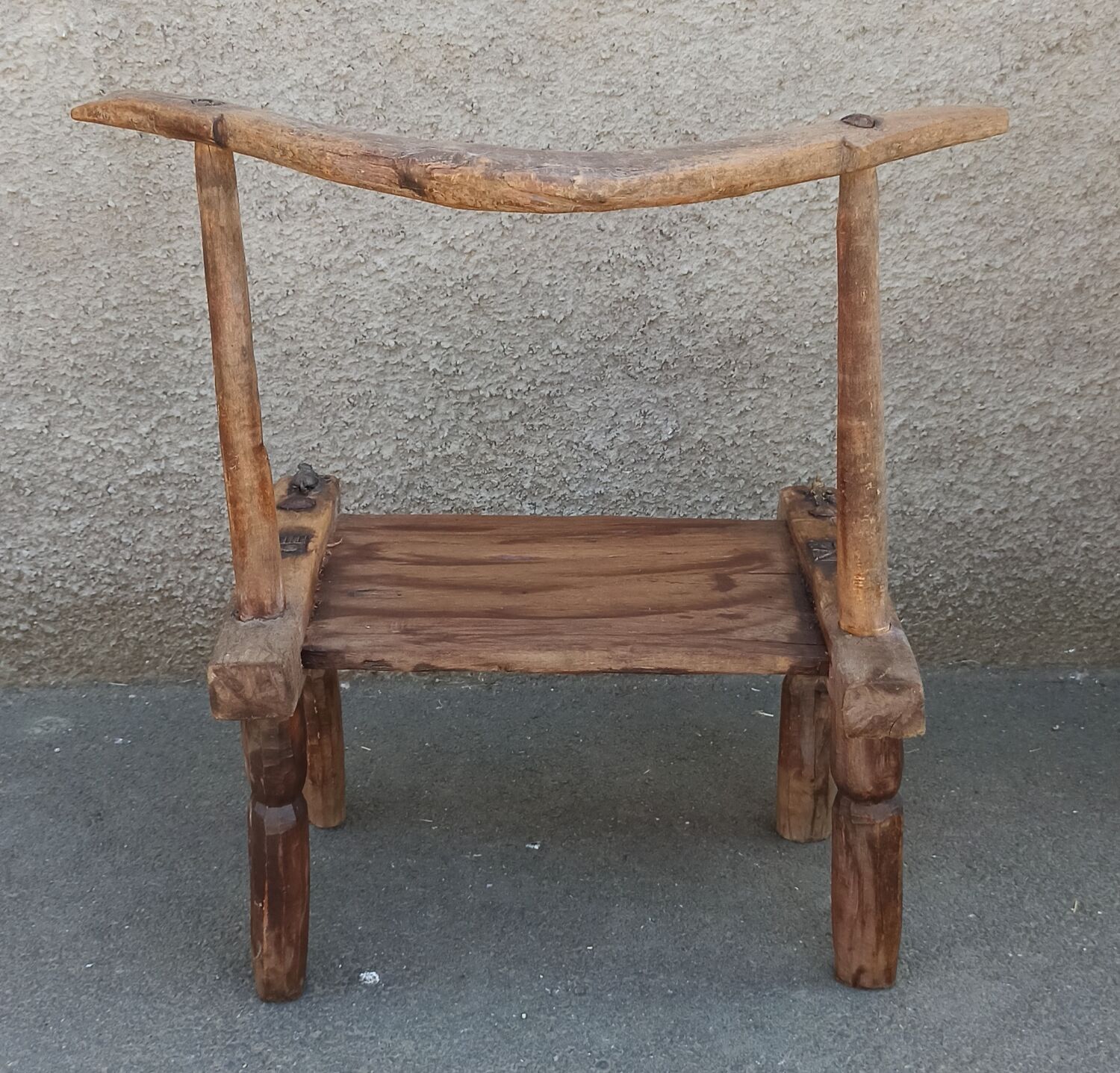 Antique wooden stool. Baoulé African art from Ivory Coast.