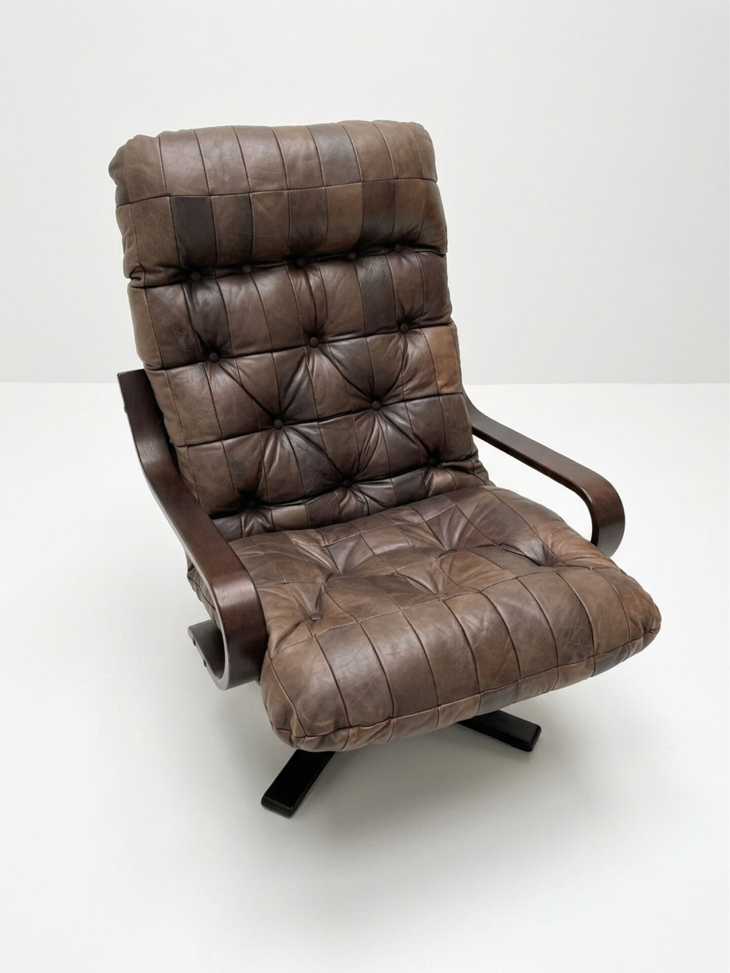 Mid-century leather swivel chair