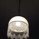 Vintage suspension in half shell speckled with pearls