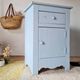 Handcrafted blue chest of drawers.