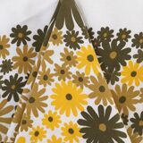 Round cotton tablecloth from the Swedish brand Almedahls. Vintage yellow and green flower patterns.