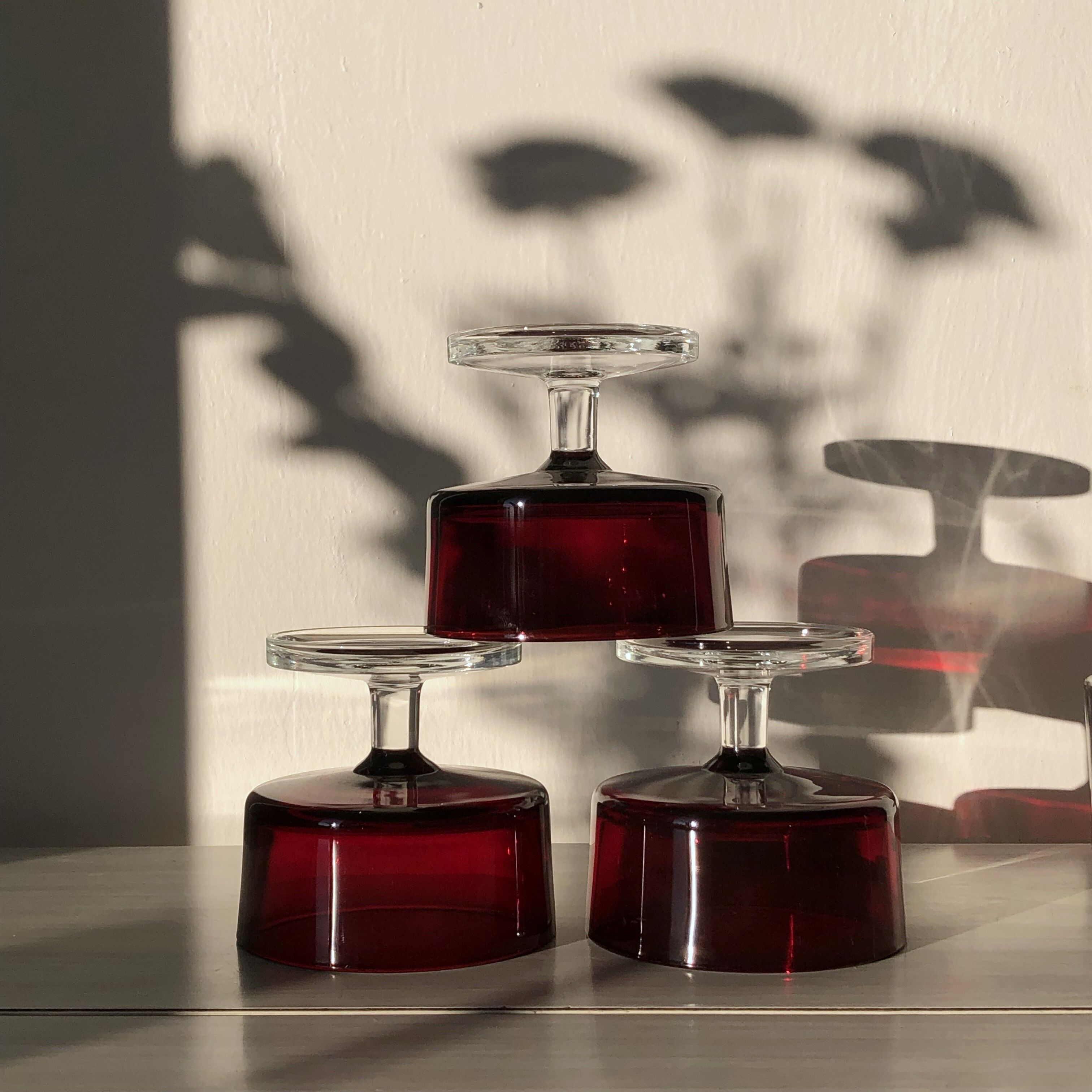 Translucent red champagne or dessert glasses, model Cavalier Luminarc 70s'.