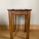 Wooden stool with central grip, quadripod base, 20th century