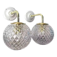 Set of two wall sconces in brass and glass
