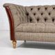 Chesterfield sofa in leather, fabric and wood