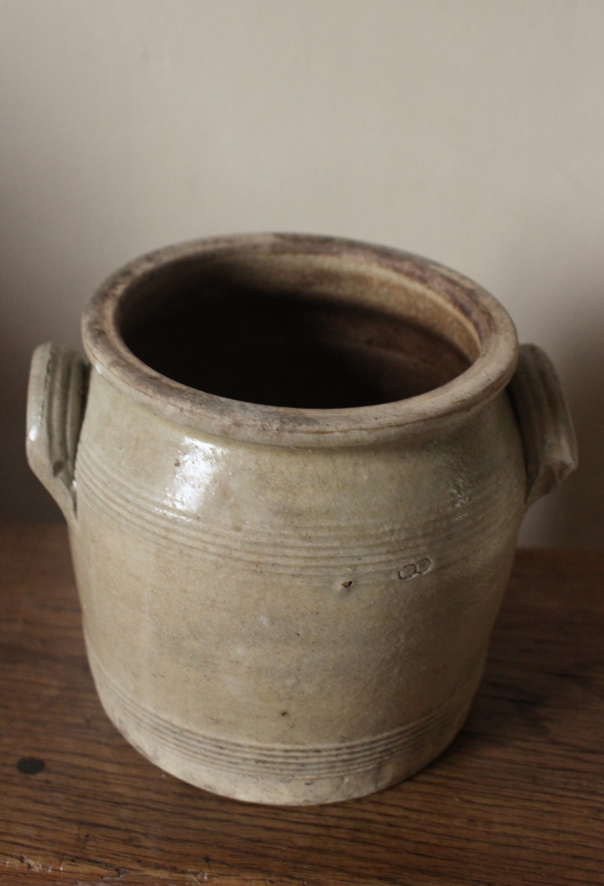 Glazed stoneware pot with two handles