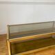 Gold metal coffee table and smoked glass